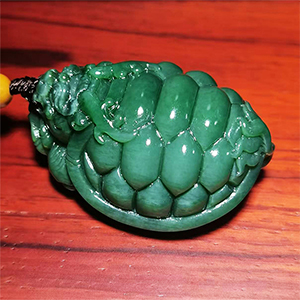 和田碧玉猫眼龙龟手把件（富贵长寿）